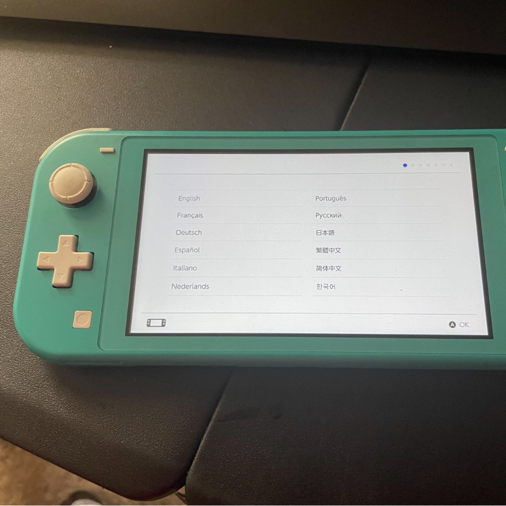 Nintendo switch with power cord .. works great son just like the virtual game